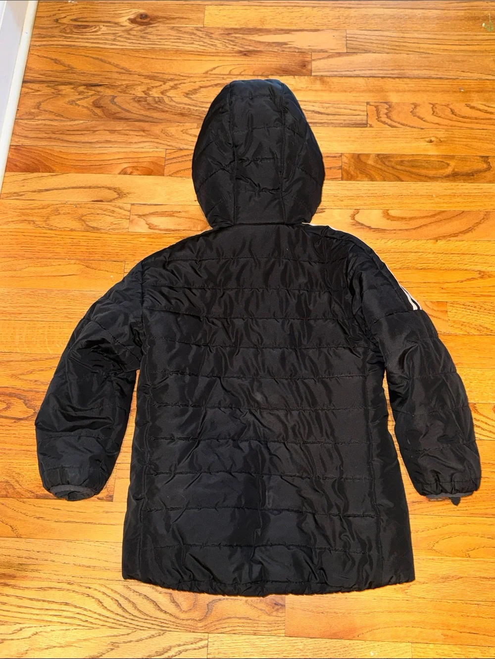 adidas kids Black Puffer Jacket with White Shoulder Stripes size small (7/8)